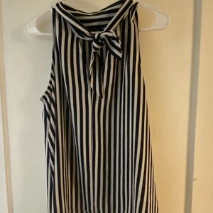 Size Large. Dressy short sleeve top.